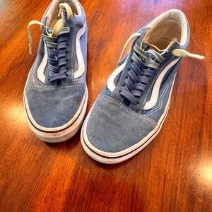 Vans shoes, blue with frogs on the side and they are a size 7.5 Mens 9 Woman’s